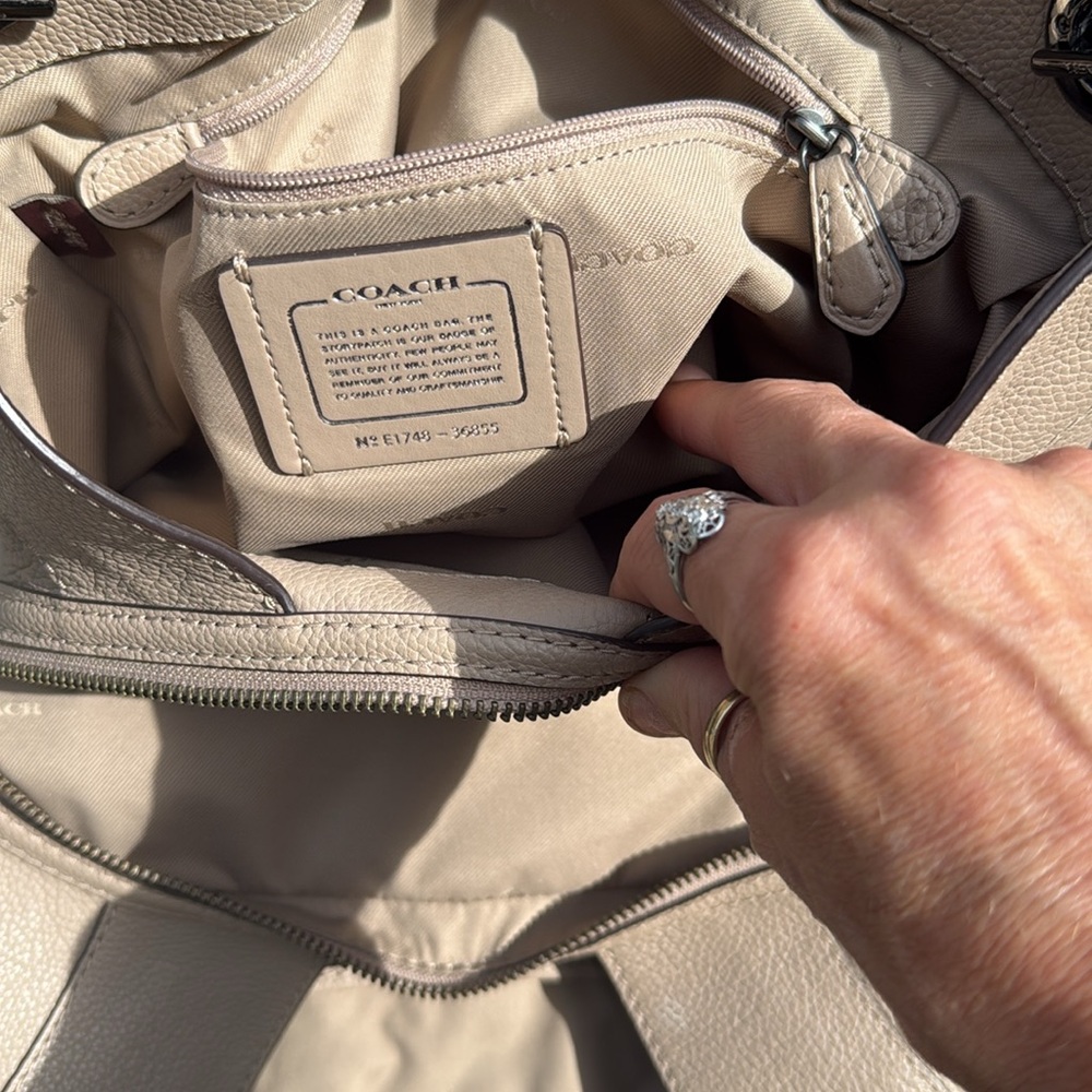 Coach Tan Leather Shoulder Bag with Timeless Design . Like new inside and out.